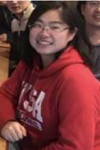 Woman with glasses and smiling